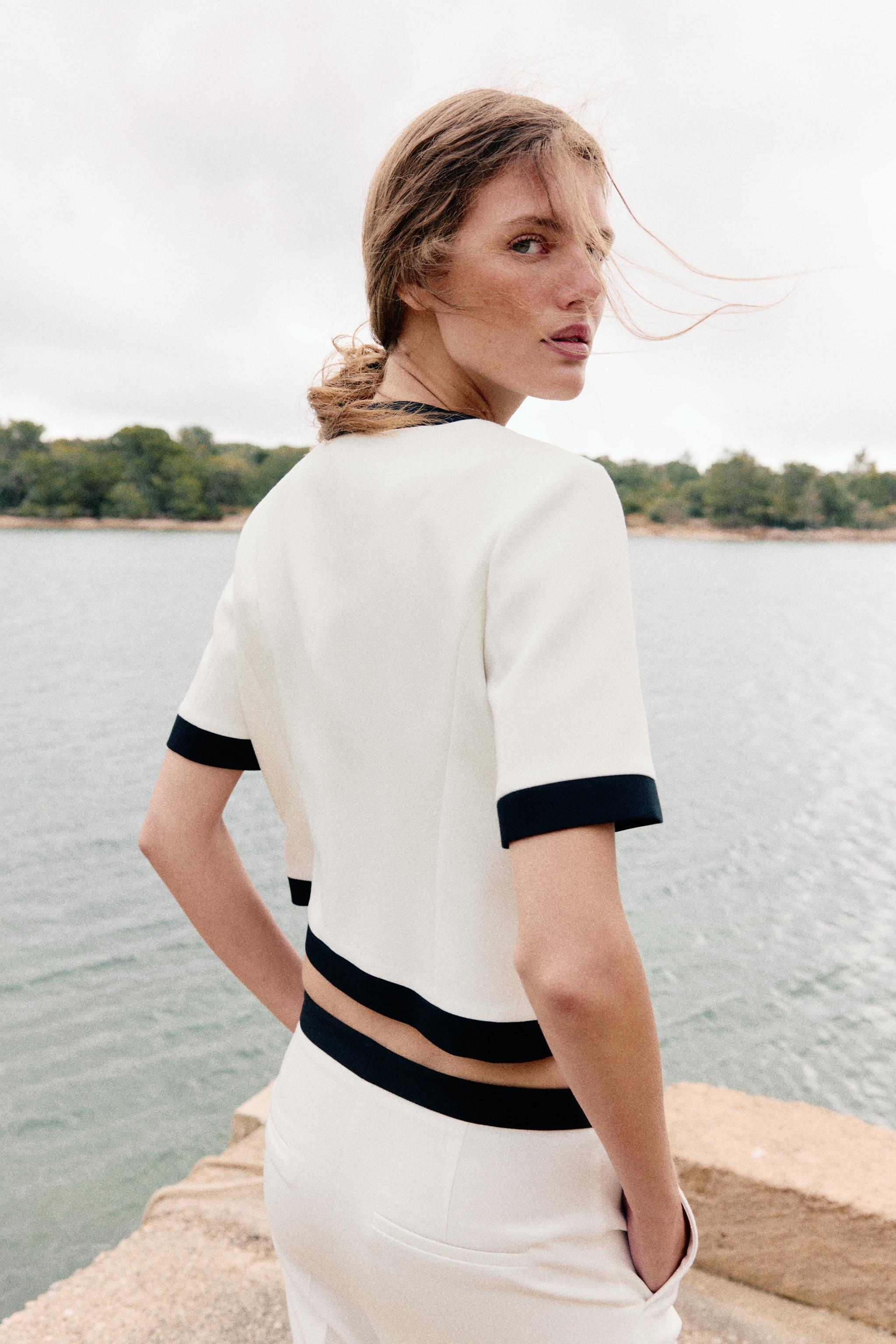SHORT SLEEVE BLAZER WITH CONTRASTING PIPING